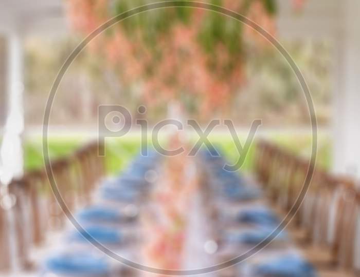 Blurry View Of Wedding Table Set For Dining.Suitable For Wedding Background.
