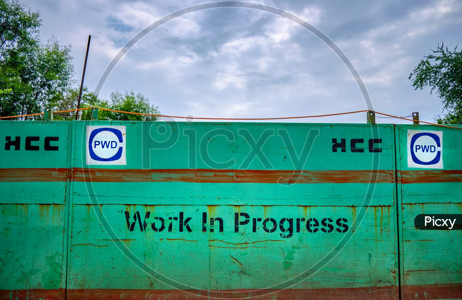 Work In Progress Sign In New Delhi, India. Hindustan Construction Company (Hcc) Contracted By The Public Works Department (Pwd) Of The Government Of Delhi