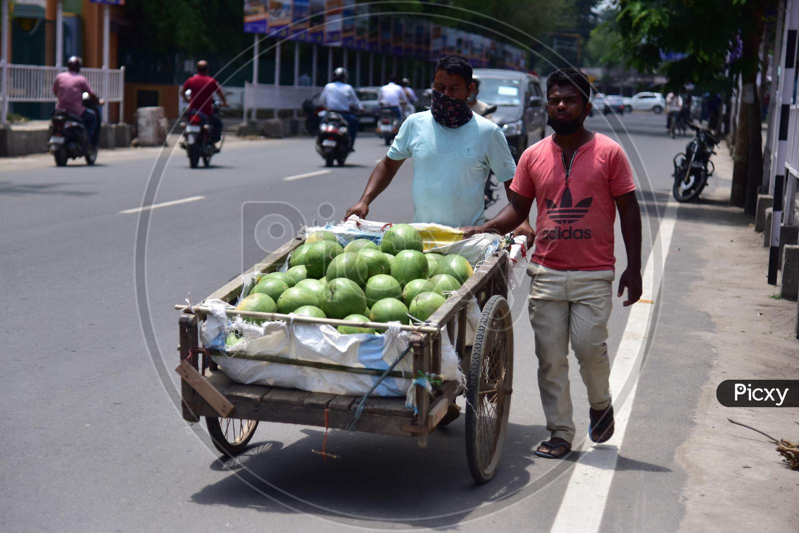 Nagaon :Vendor Carry Watermelon  On His Cart After Authorities Allowed Sale  With Certain Restrictions, During The Ongoing Covid-19 Nationwide Lockdown In Nagaon District Of Assam On May 04,2020 ..Pix By Anuwar Hazarika