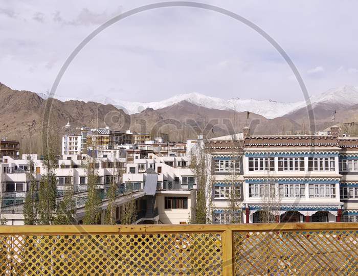 Leh city with mountains background from Leh Palace located in Leh, Ladakh, Jammu and Kashmir, India.