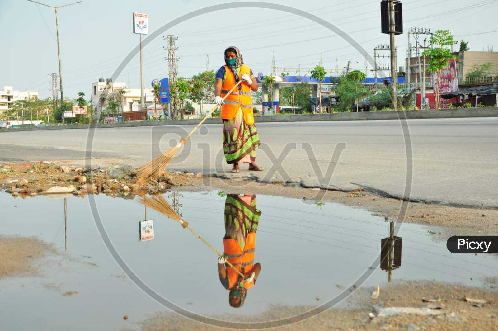 Sanitary worker cleaning a road in Hyderabad