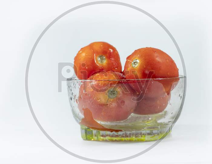 Red tomatto, isolated on a white background