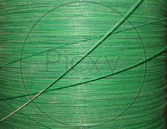 This is a bundle of the kite thread of green colour.