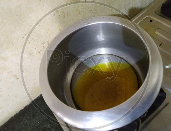 Cooking oil inside the pressure cooker