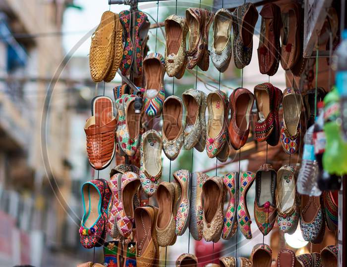 Traditional Indian Shoes At Bapu Bazar In Jaipur, India. Bapu Bazar In Jaipur Is One Of The Most Famous Markets Of The City For Buying Traditional Indian Shoes And Jutis, Rajasthan, India