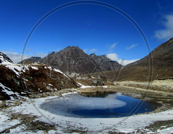 Frozen lake in Sela Pass