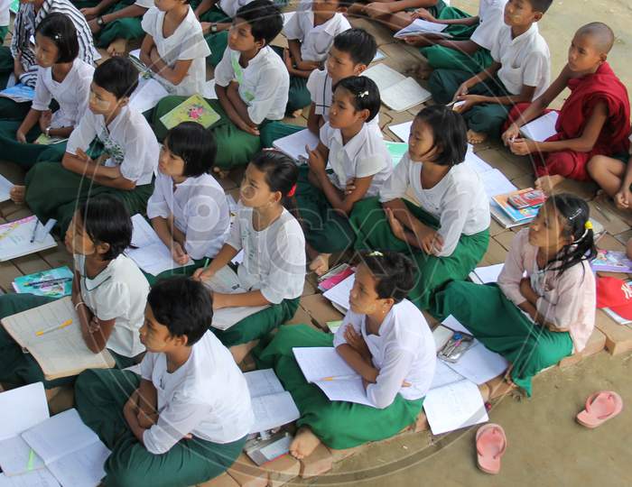 SAGAING, MYANMAR - JANUARY 27, 2014: Unidentified Burmese girls and boys in a local school during the lesson.