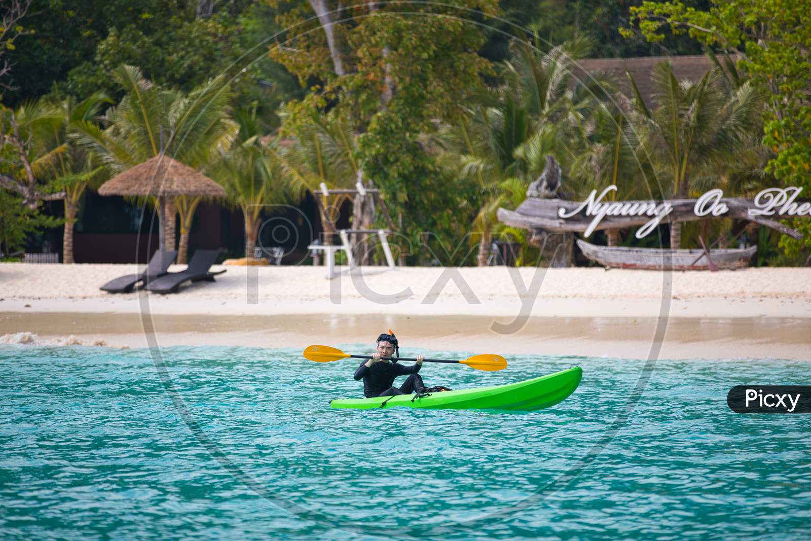 A Person boating in a Beach