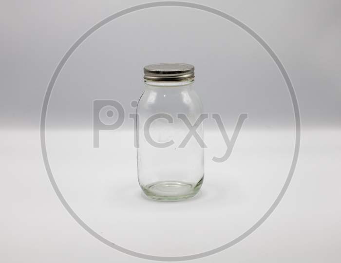 A Glass Bottle on White Background
