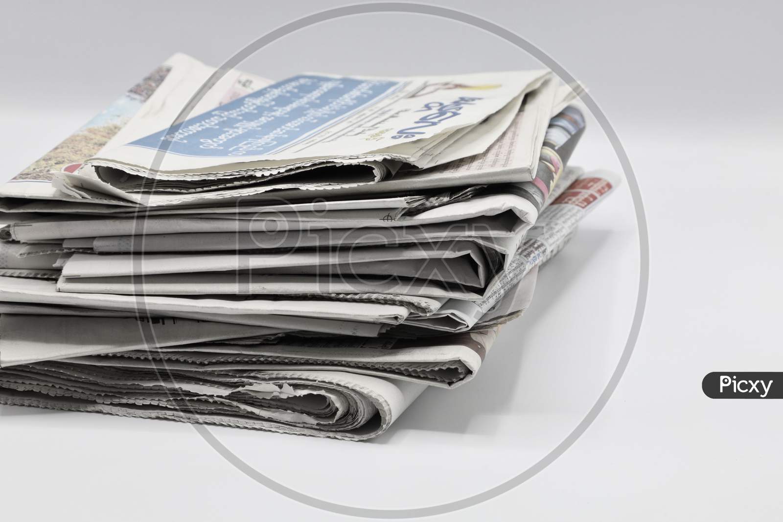 A Bundle of Newspapers isolated on white background
