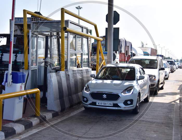 Cars Waiting To Pass Through  A Toll Plaza Of The National Highway Authority Of India (Nhai )After Authorities Allowed   With Certain Restrictions  During The Ongoing Covid-19 or Coronavirus  Nationwide Lockdown In Nagaon District Of Assam On May 4,2020
