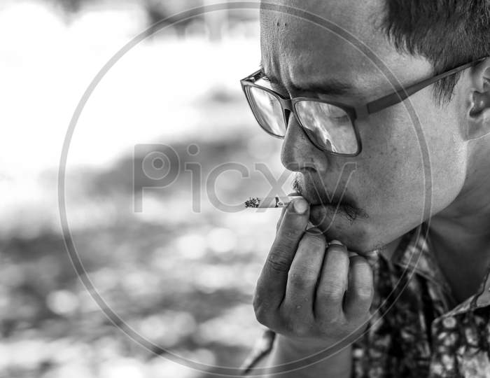 A Young man with a cigarette