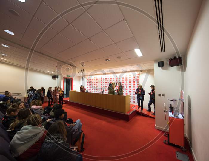 A Meeting Hall with Journalists