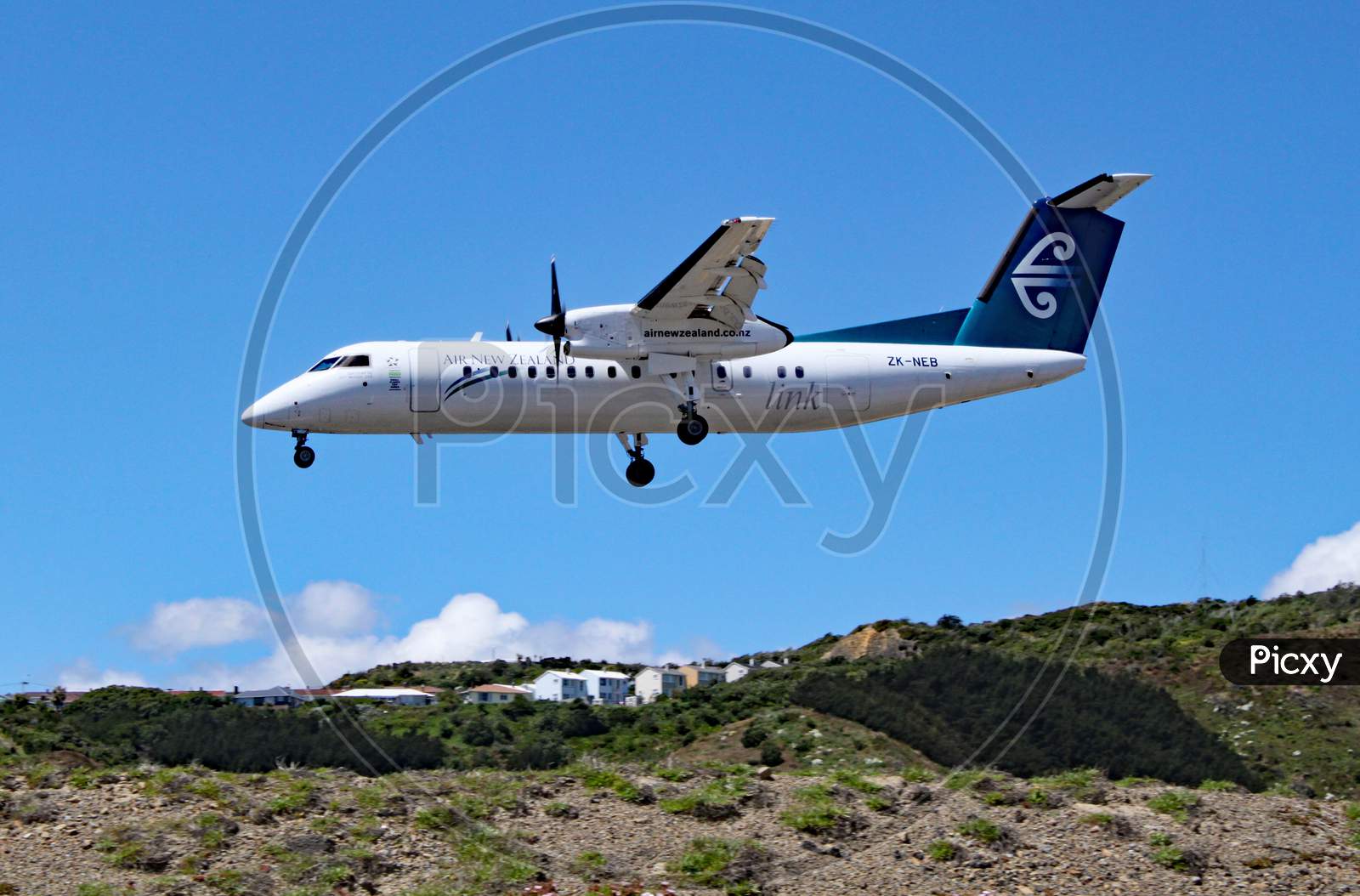 An Air New Zealand De Havilland Canada Dash 8 Comes In To Land At Wellington Airport, New Zealand