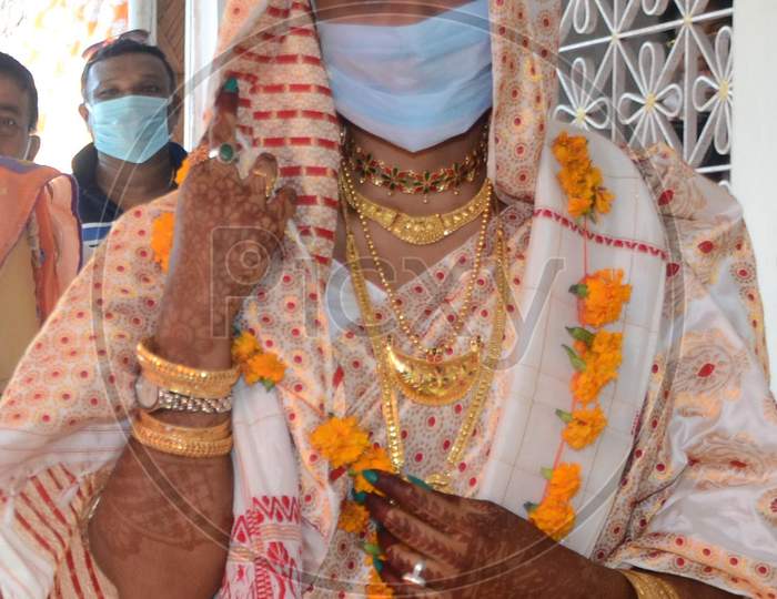 An  Assamese  Bride  Wearing Mask On Her Wedding During The Ongoing Covid-19 Nationwide Lockdown At Bishnupur In Nagaon District Of Assam On May 03,2020.
