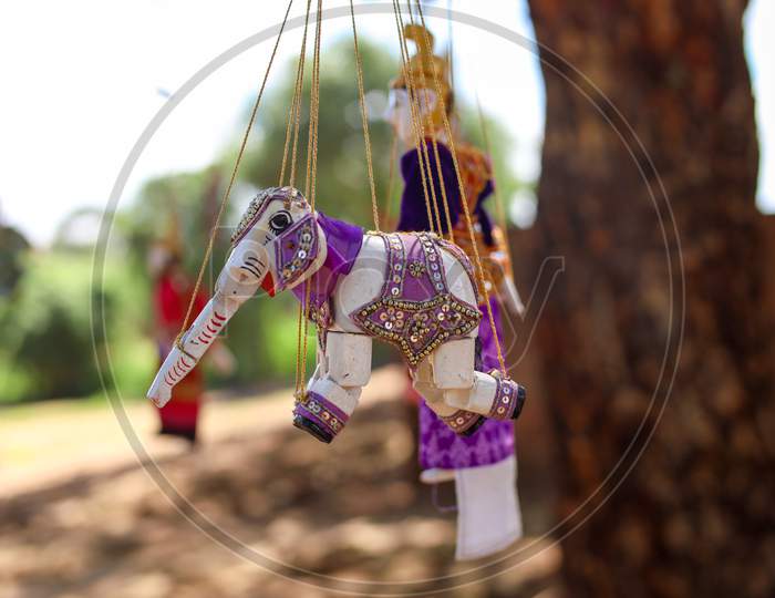 Selective Focus on Hanging Toy with Blur Background