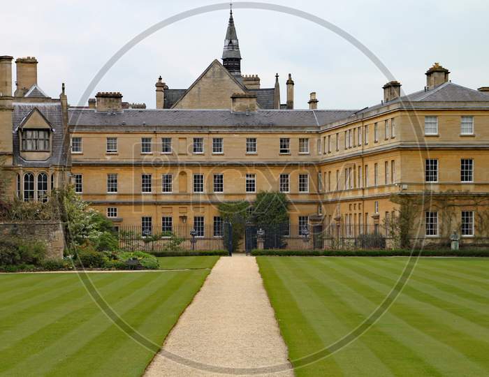 Oxford, England - April 14Th 2011: Trinity College Stands In Front Of Well Manicured Lawns And Has Been The Place Of Education Of Many Famous People
