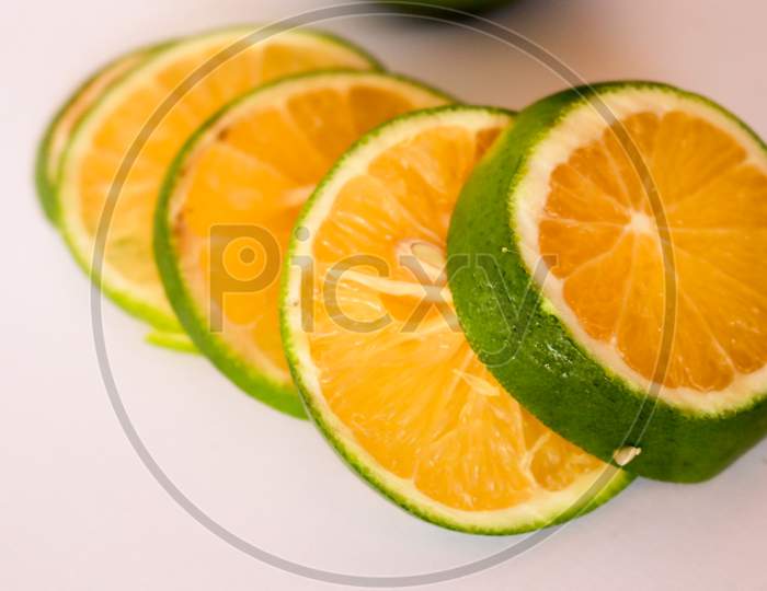 Slice Of Mosambi Over White Background, Sweet Lemon Isolated On White Background
