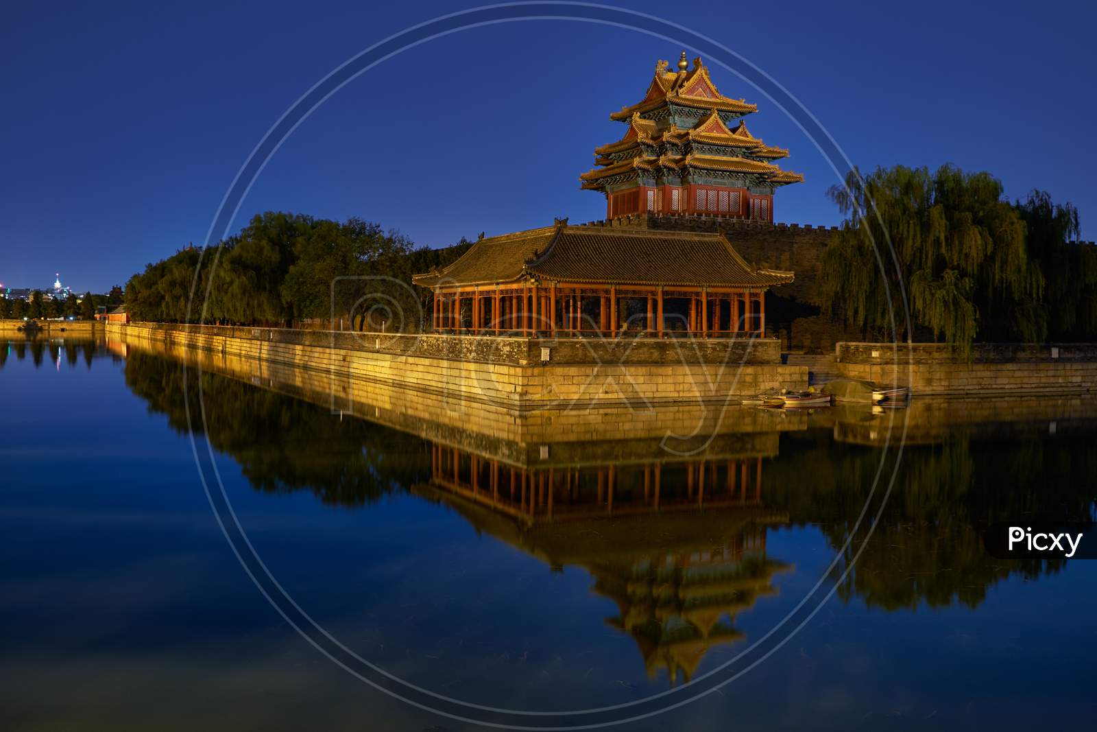 Northwestern Tower Of The Forbidden City Palace Museum In Beijing, China, Reflecting In The Water Moat At Night