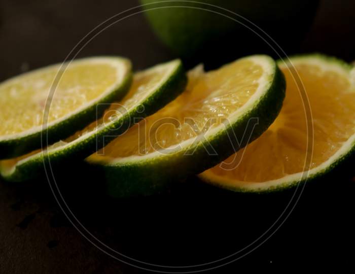 sweet lemon (Mosambi) isolated on black background.