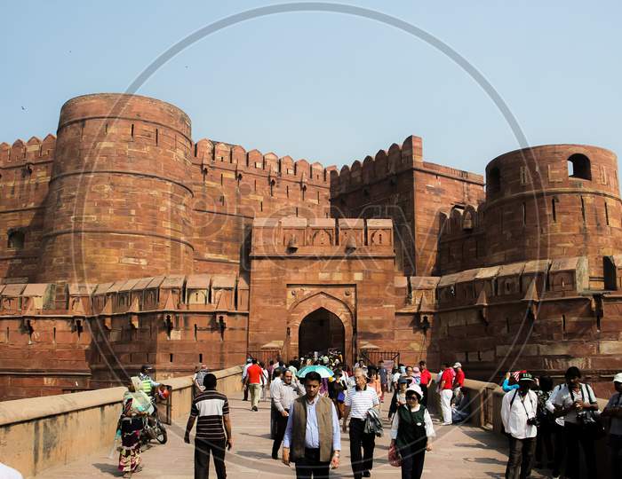 Historic red sandstone fort of medieval India at sunrise. Agra Fort is a UNESCO World Heritage site in the city of Agra India.