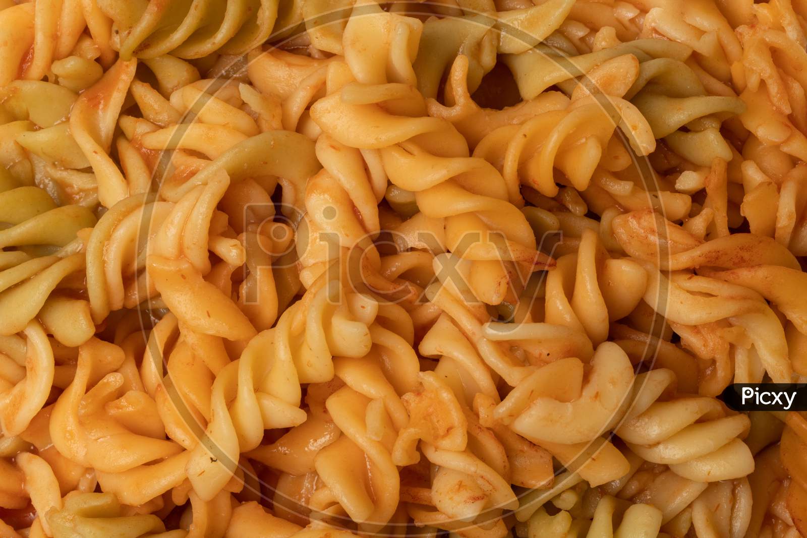 Penne Pasta On A Plate With Sauce