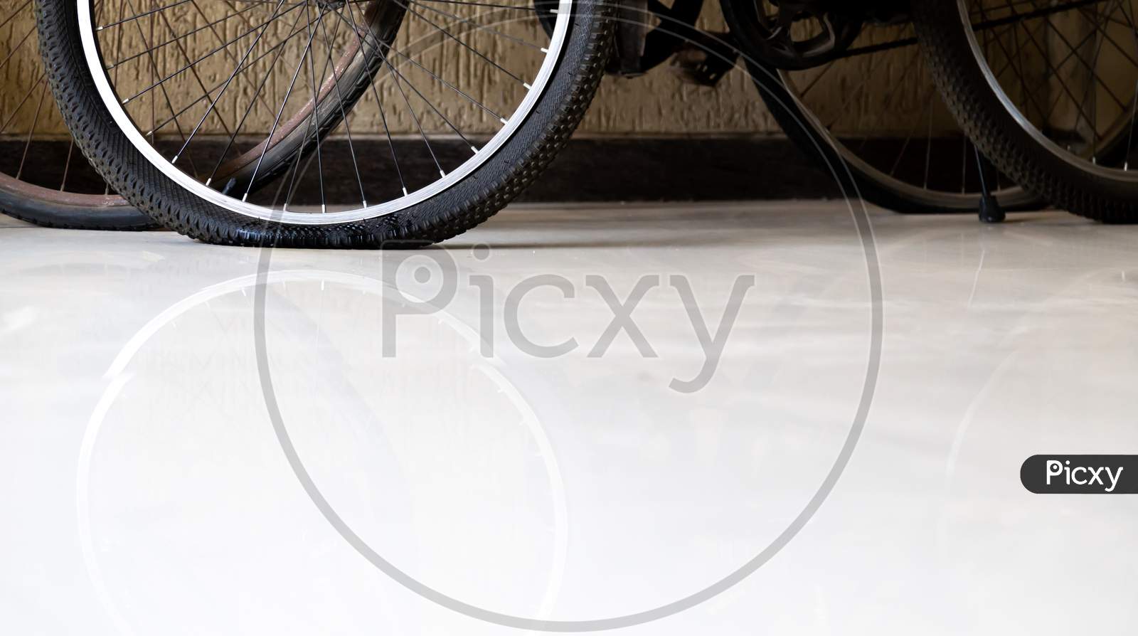Flat Tyre bicycle or bike parked at the corridor