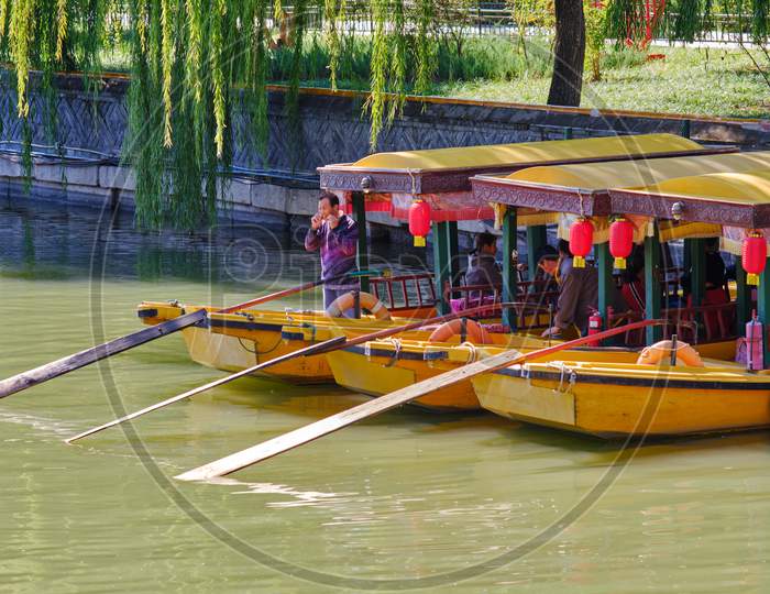 Tourist Boats In Old Imperial Gardens Of Beihai Lake, Beihai Park In Beijing