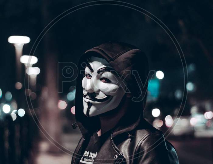 Man wearing jacket and mask bokeh edited picture