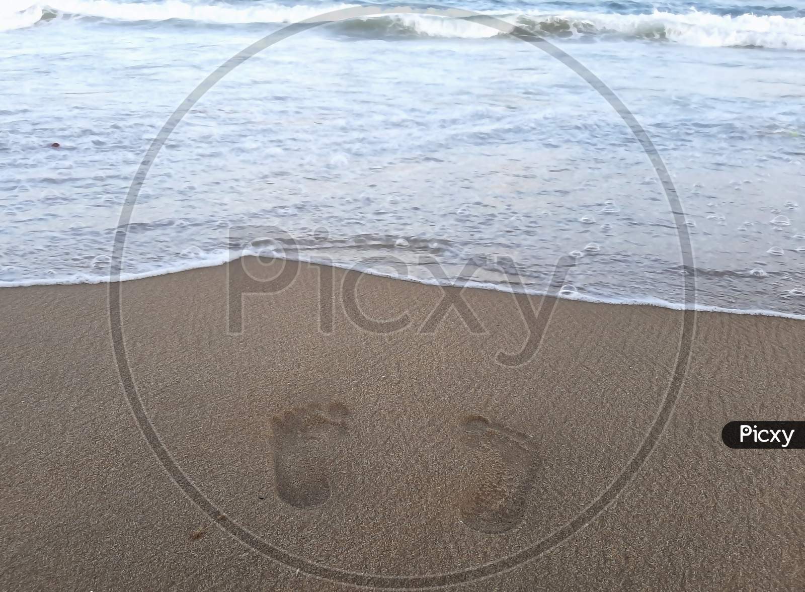 Footprint on the sea beach