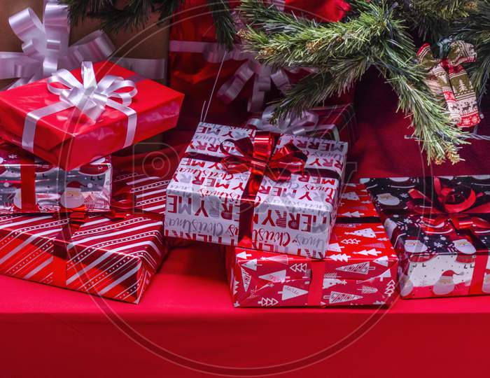 Christmas gifts wrapped up under the Christmas tree.