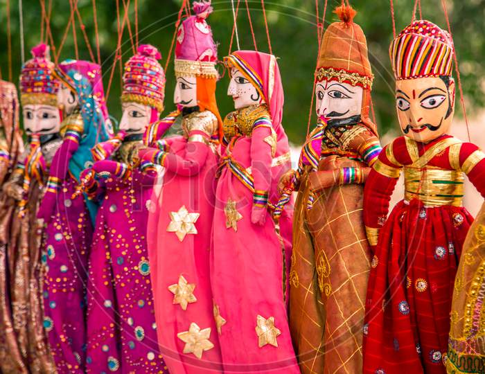 Focused And Defocused Version Of Handicraft Rajasthani Puppets Toys Displayed For Sale In Jodhpur