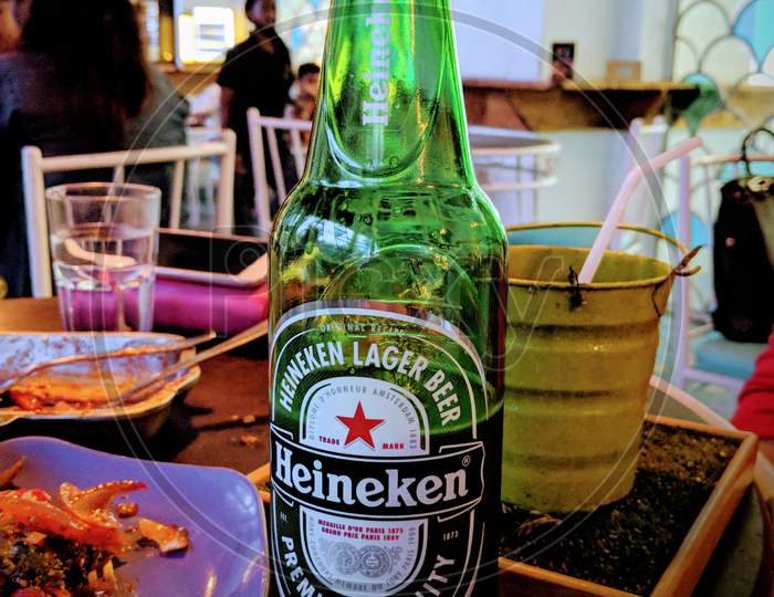 Chilled Heineken beer bottle , Summer time, Day, May 2019, Kolkata restaurant ,  India, Asia, A bottle of refreshment in summer days