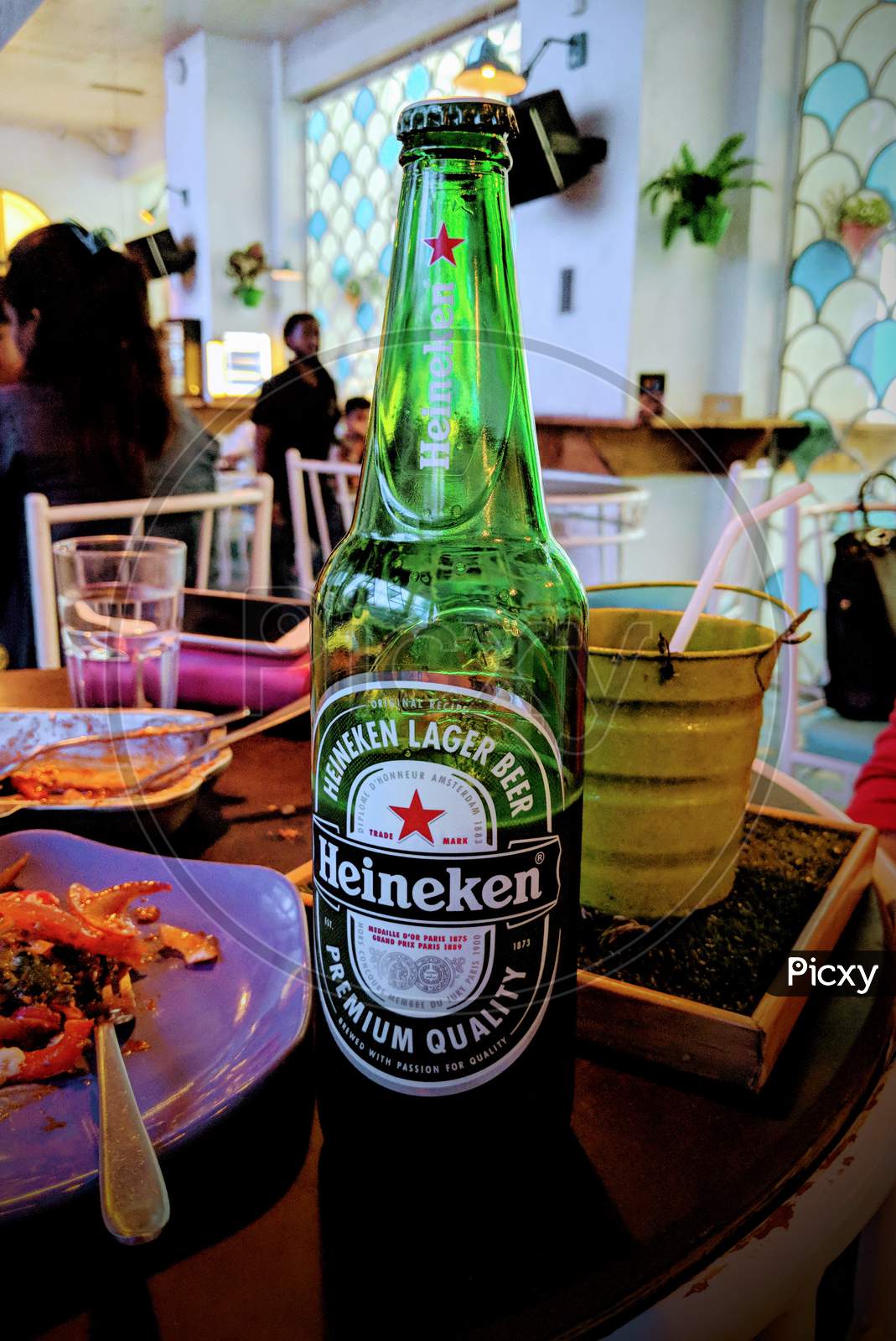 Chilled Heineken beer bottle , Summer time, Day, May 2019, Kolkata restaurant ,  India, Asia, A bottle of refreshment in summer days