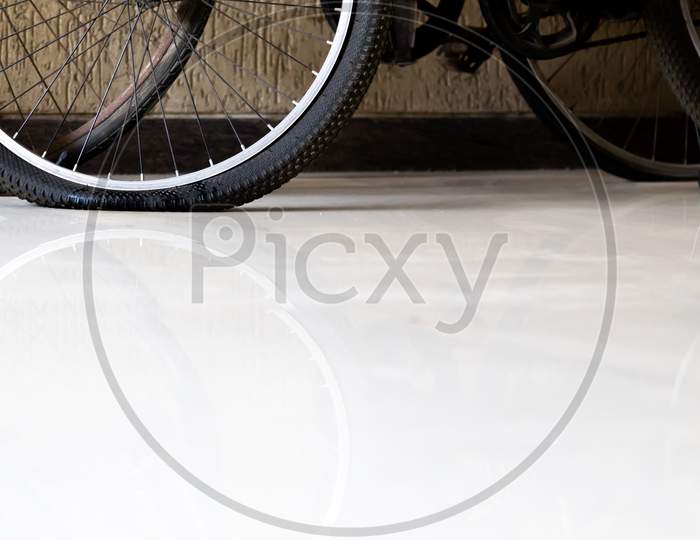 Flat Tyre bicycle or bike parked at the corridor
