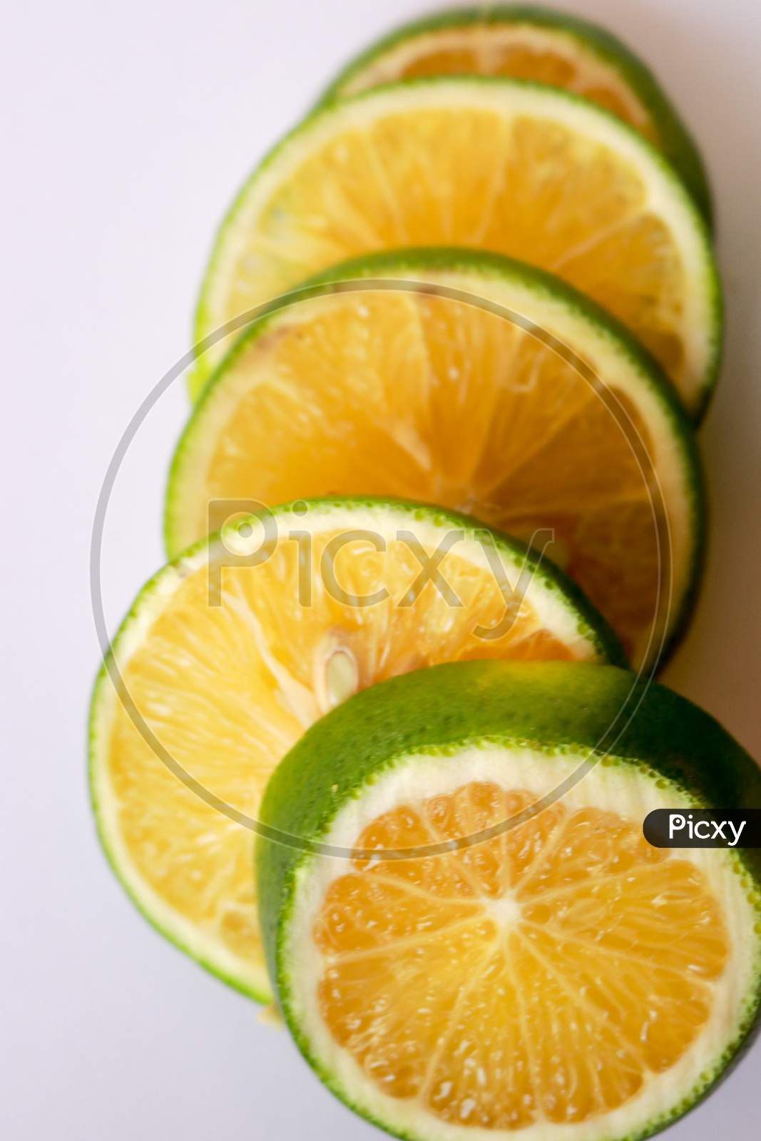 mosambi sweet lime fruit with white background half cut
