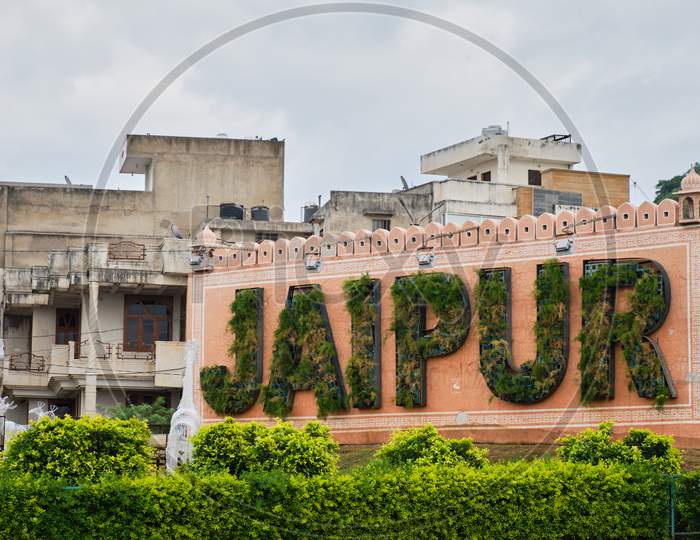 Green Plants Decorated To Form The Text "Jaipur", Landamark Of Famous Pink City Jaipur In Rajasthan, India