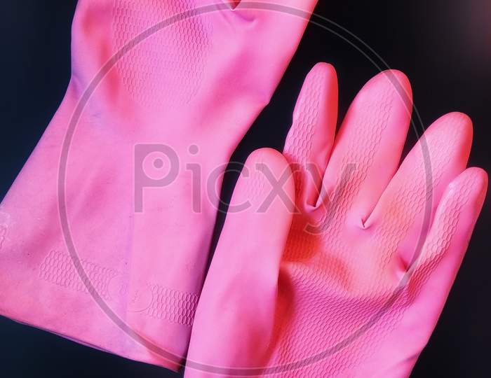 Pink rubber gloves elastic material