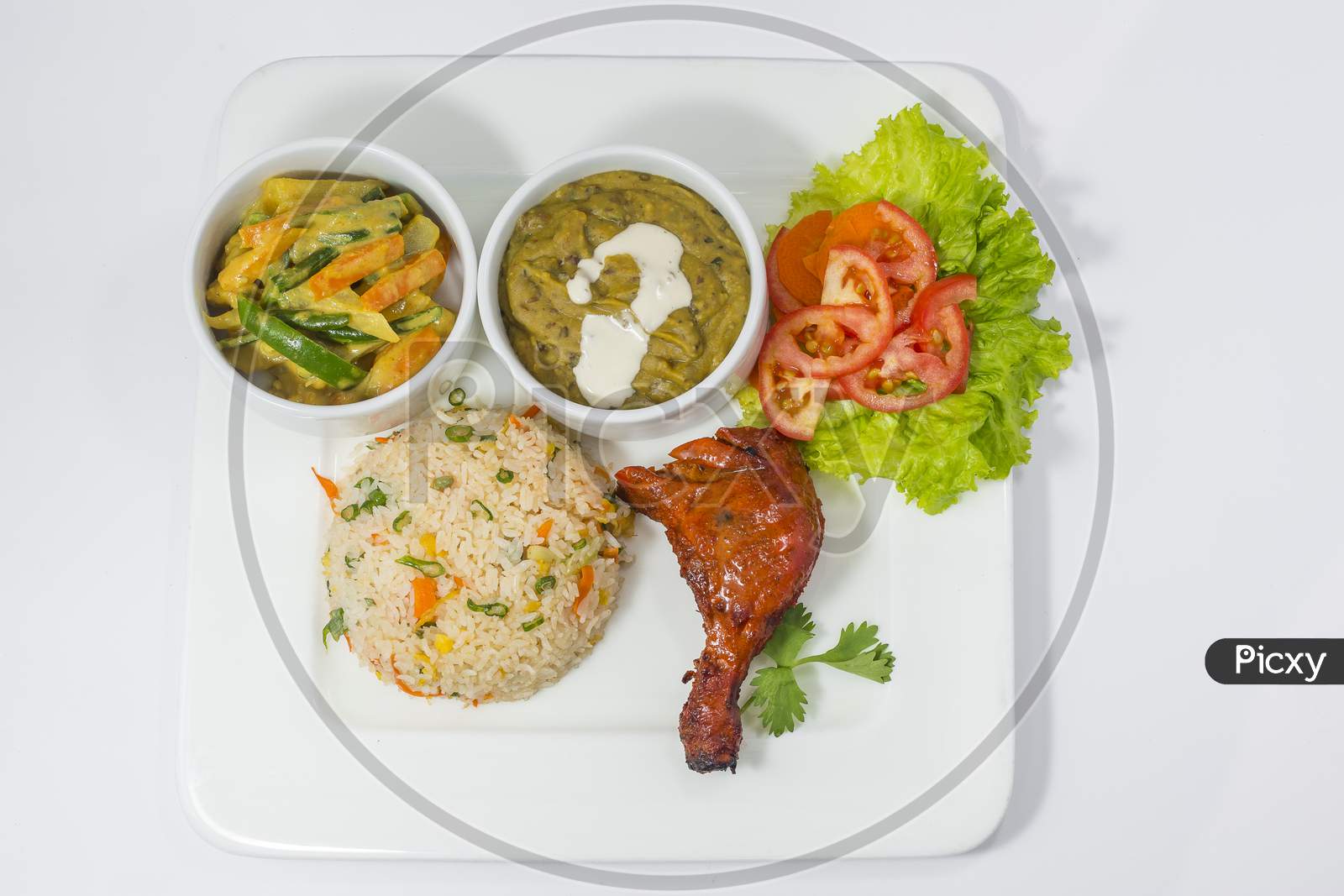 Tandoori Chicken, Dal Makhani, Mixed Vegetable, Green Salad and Fried Platter.