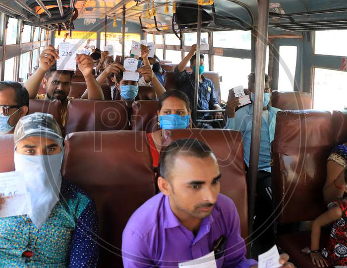 Migrant Workers From Gujarat  Showing Train Ticket After Boarding Buses During Nationwide Lockdown Amidst Coronavirus Or COVID- 19 Pandemic, in Prayagraj, May 6, 2020