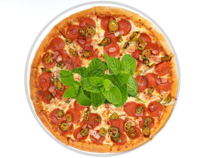 Pizza with peppermint leaf isolated on white background. fast food.