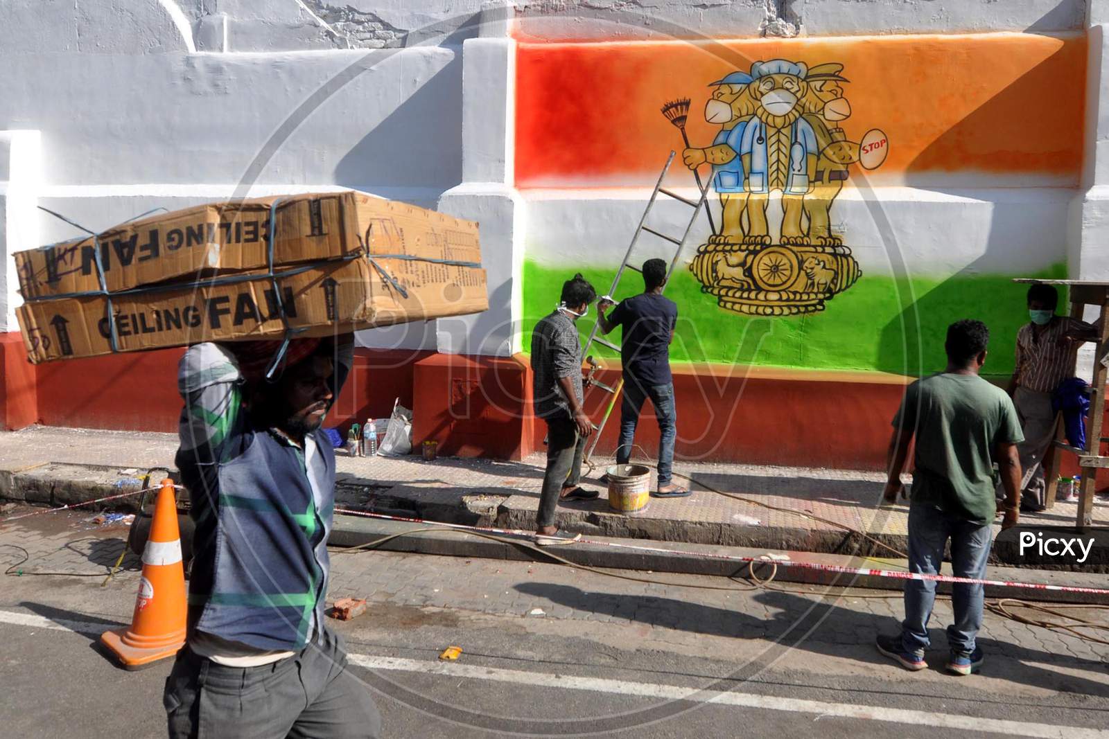 Artists Draw A  Mural On A Wall To Spread  Awareness  During Nationwide Lockdown  Amidst Coronavirus Or COVID-19 Pandemic  In Guwahati, Wednesday, May 6, 2020.