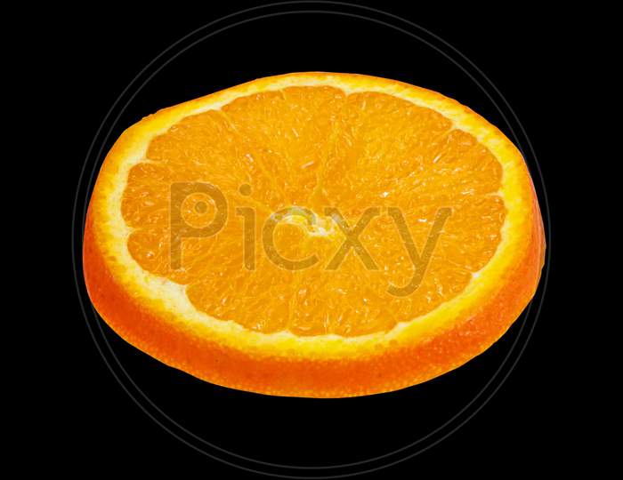 Perfectly retouched sliced orange isolated on black background,side view.nutritious food