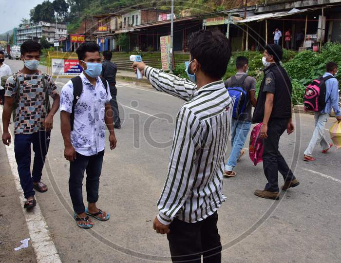 Thermal Screening Of  Migrant Workers  After Their Arrival From Meghalaya  On The Border Of Assam  And  Meghalaya During Nationwide Lockdown Amidst Coronavirus or COVID-19 Pandemic In Guwahati,India