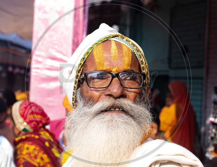 Pushkar,Rajasthan /India. 06 /11/2019. Indian Senior Old Sadhu With Tilak On Forehead And White Beard On Streets Of India