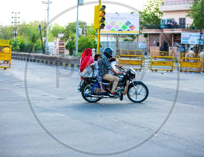 Jodhpur, Rajashtbn, India. 30 March 2020. People Wearing Masks On Vehicle Going One Place To Another, Coronavirus, Covid-19 Outbreak In India. Lockdown / Curfew Emergency In The Country.