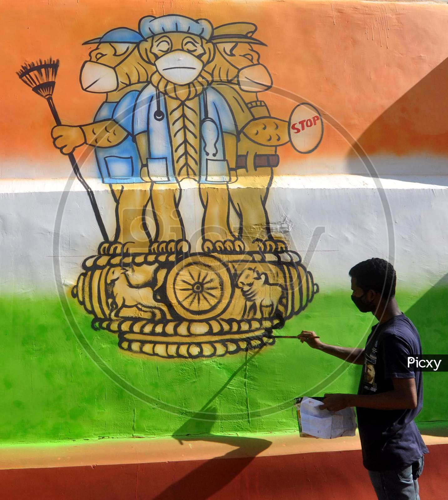 An artist Draws A  Mural On A Wall To Spread  Awareness  During Nationwide Lockdown  Amidst Coronavirus Or COVID-19 Pandemic  In Guwahati, Wednesday, May 6, 2020.onavirus Or COVID-19 Pandemic  In Guwahati, Wednesday, May 6, 2020.