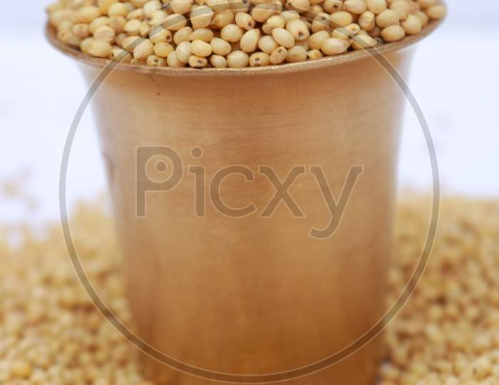 Cereal Grains , Seeds, Beans Spike Indian And Wheat Grain In Burlap Bag Isolated On White Background