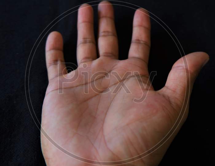 different symbols of hand in black background