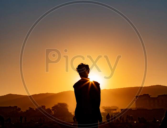 Silhouette Of Man In Sunrise A Symbol Of Hope In A New Beginning
